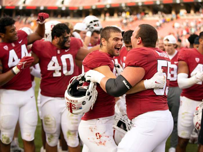 Oct 22, 2022; Stanford, California, USA; Stanford Cardinal edge rusher Lance Keneley (left) and center Drake Metcalf (55) celebrate following their 15-14 victory over the Arizona State Sun Devils at Stanford Stadium. Mandatory Credit: D. Ross Cameron-USA TODAY Sports